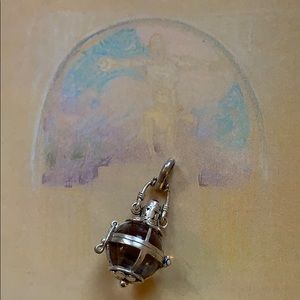 Silver cage pendant with quartz ball